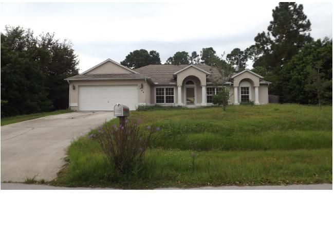 1042 Sw Calmar Ave, Port Saint Lucie, FL 34953