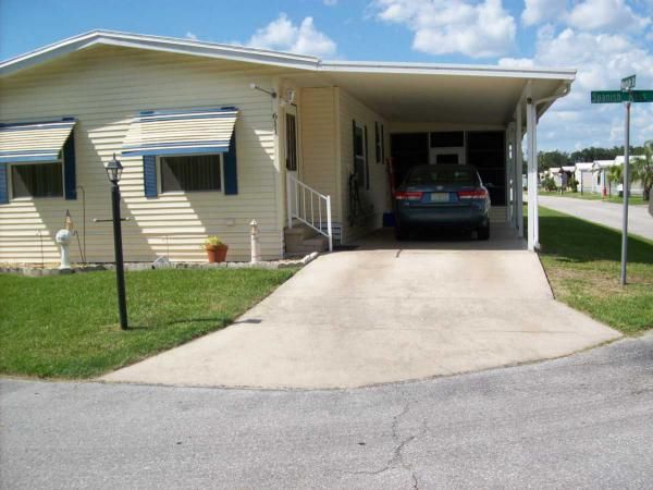 611 SPANISH MOSS DRIVE, Wildwood, FL 34785