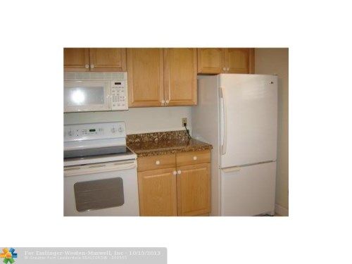 3850 Oaks Clubhouse Dr # 506, Pompano Beach, FL 33069